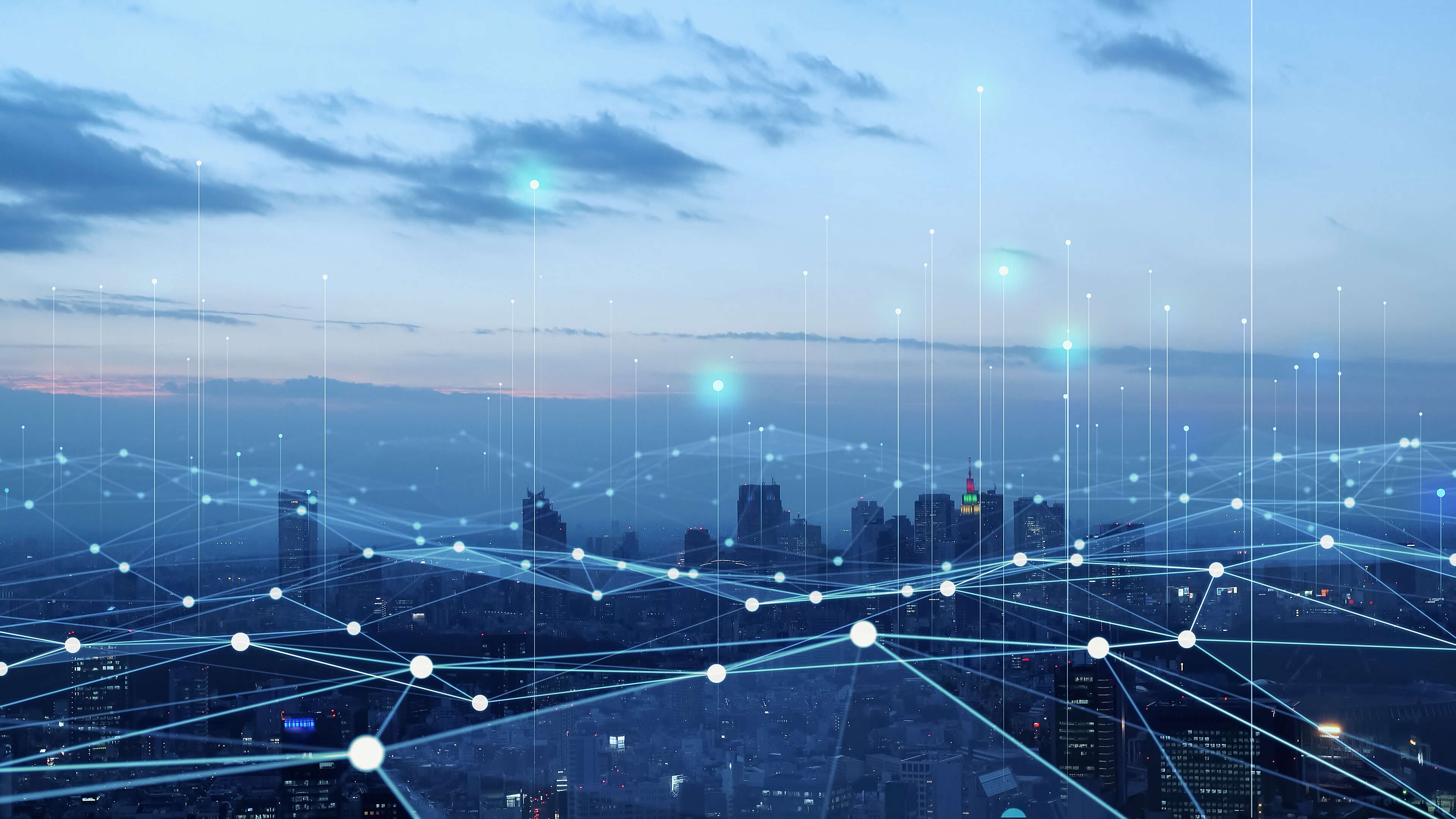 Ein Netz aus Lichtern, das sich über eine Stadt erstreckt und die digitale Verbindung symbolisiert